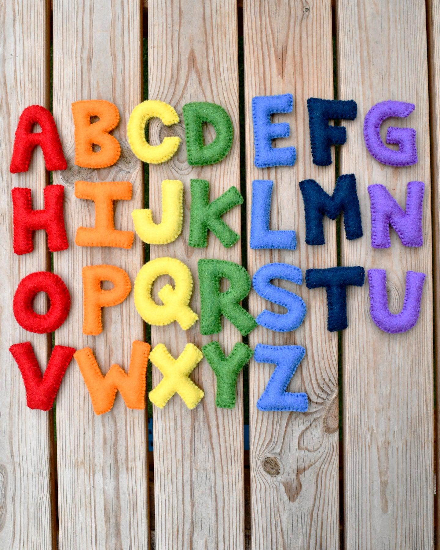 Uppercase Realistic Letters E F G H Made Of Color Felt Fabric For